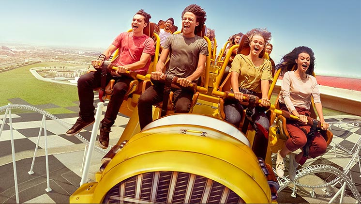 Friends having so much excitement whilst riding Flying Aces at Ferrari World